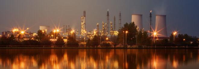 coal plant lit up at night