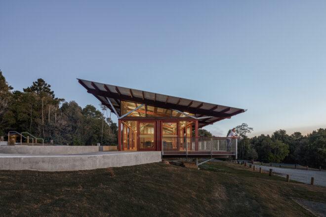 glass building with slanted roof
