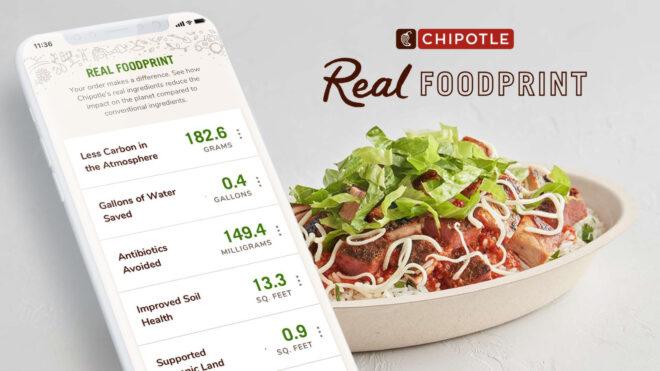 phone with emissions related to food shown on screen next to a Chipotle burrito bowl