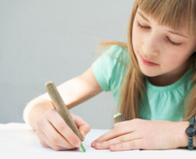 child drawing with biodegradable marker