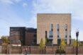brick school building with narrow windows