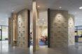 curving wall opening to a classroom