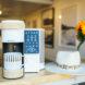 ceramic coffee mug sitting in a white and bamboo coffee machine