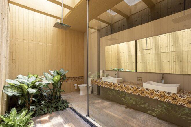 tan bathroom with double-sinks