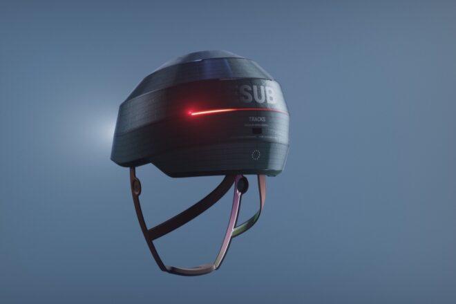 A black helmet with a red light-up strip and the text "ESUB" written on it.