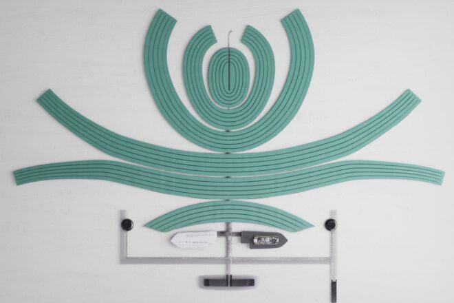 Cyan-colored straps arranged next to each other.