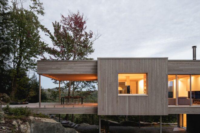long timber home on stilts