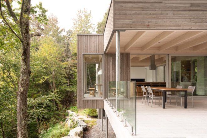 dining area with wall opening to balcony