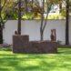 four plant-based walls in a park