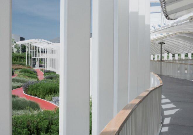 mall pathway overlooking an outdoor garden