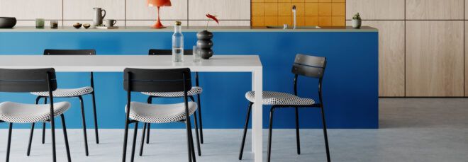 black dining chairs with patterned seats around a white dining table