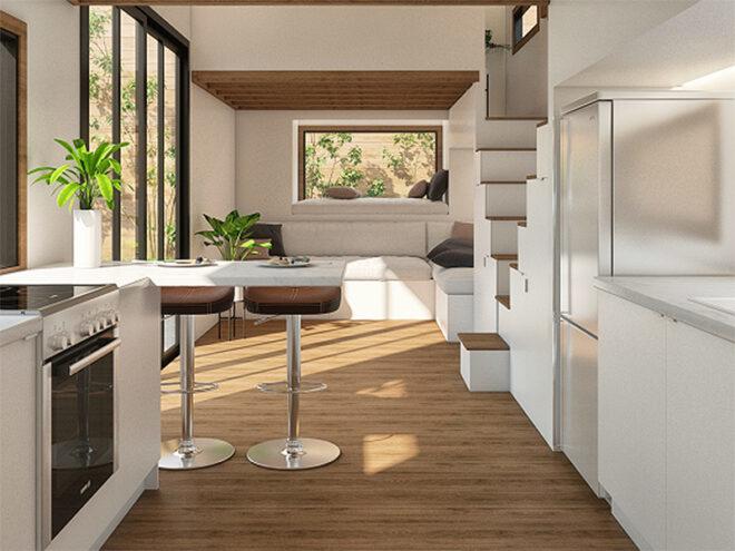 rendering of white tiny home kitchen with stainless steel appliances