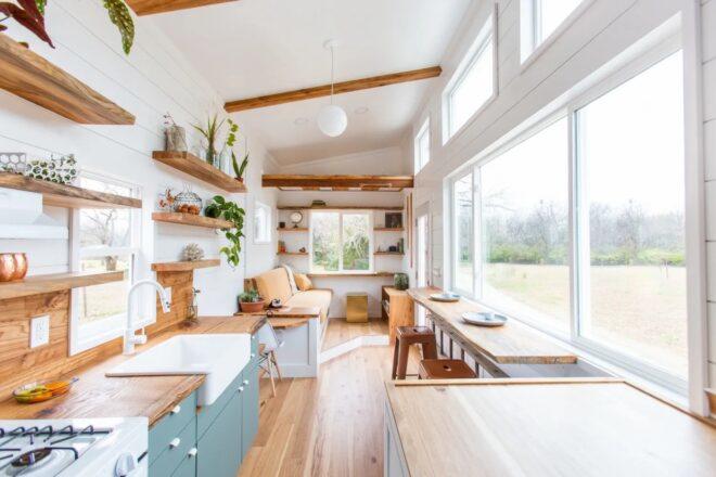 bright tiny home interior with wood and copper accents