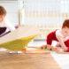 yellow bird-shaped air monitor on table with kids playing with blocks in the background