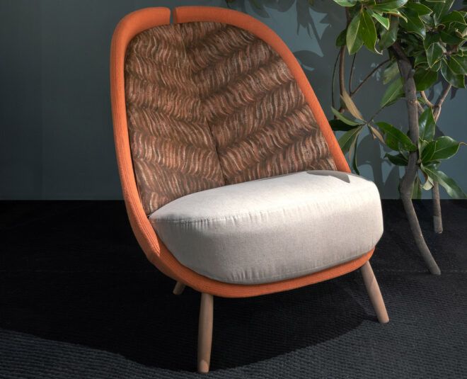 beige, brown and orange chair near a plant