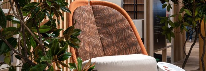 beige, brown and orange chair near a plant