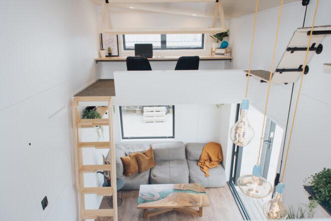 aerial view of tiny home interior with two lofts