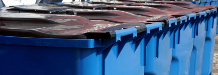 line of blue trash bins
