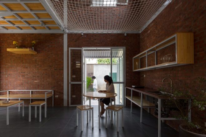 person sitting at round dining table