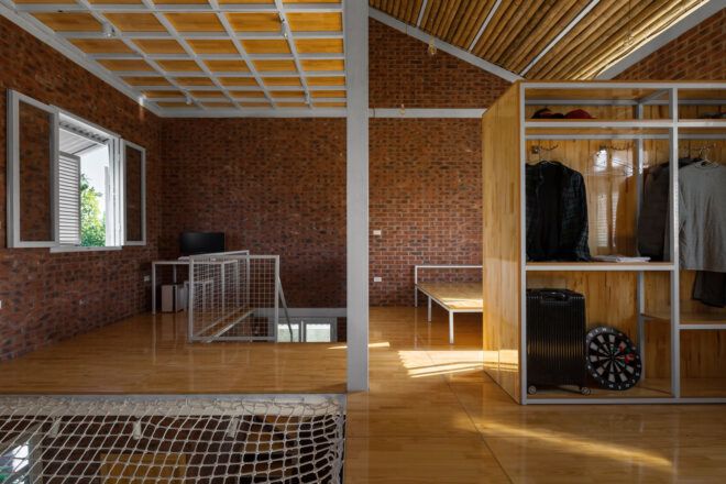 upper floor with brick walls and netted flooring