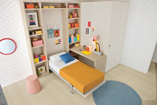 child's murphy bed next to a small wood desk