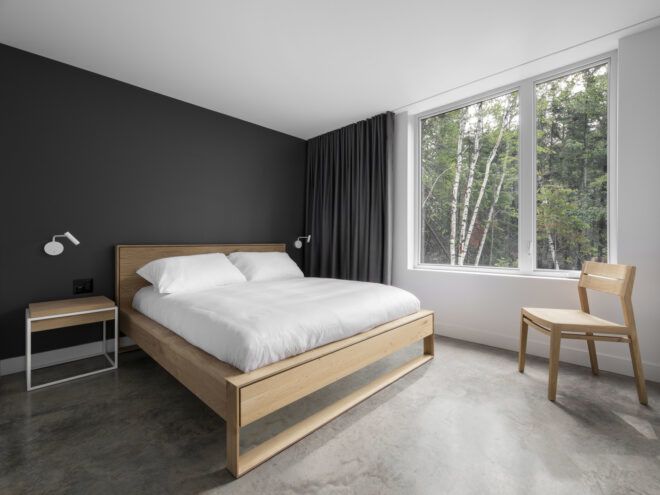 light wood bed in a gray and white room
