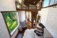 aerial view of tiny home interior with sofa and small chair