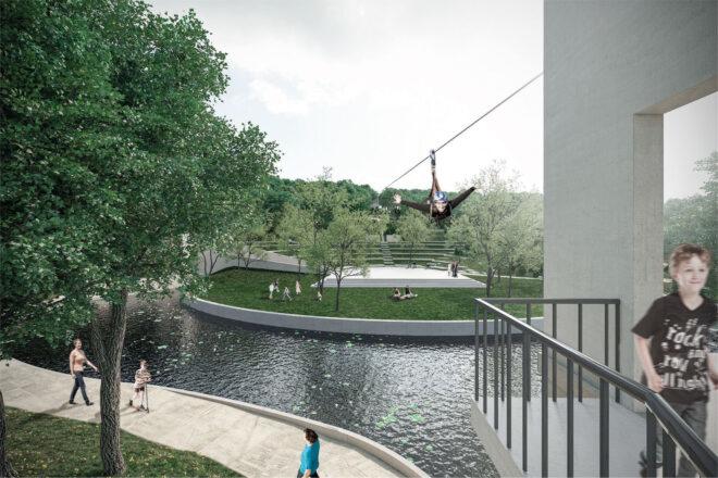 A zipline over a pond in a park.