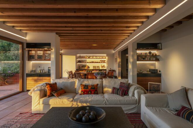 wood dining table behind white sofa