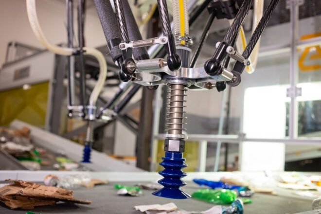 robot on recycling conveyer belt