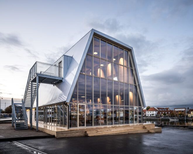 glass building with metal roof