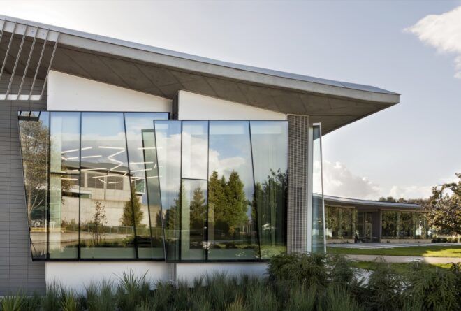 off-kilter glazing on the outside of a concrete building