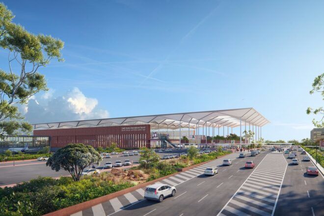 rendering of cars driving past large white airport building