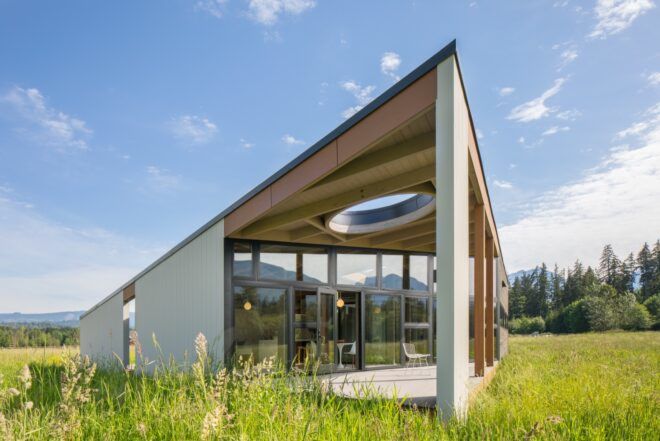 gray home with sharply angled roof