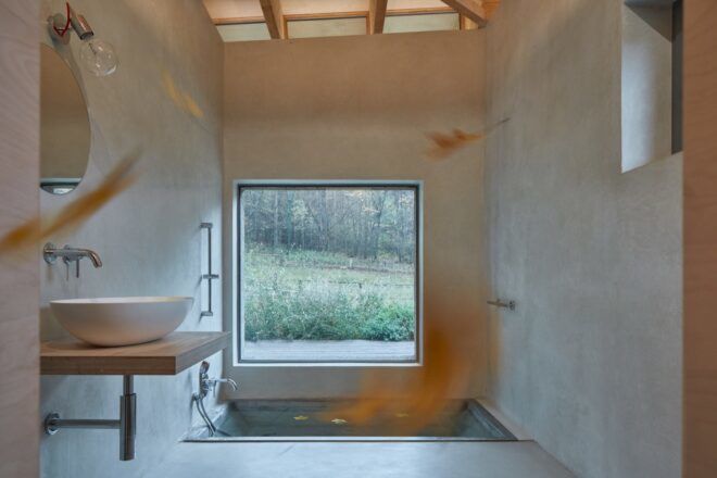 hempcrete bathroom interior with sunken tub