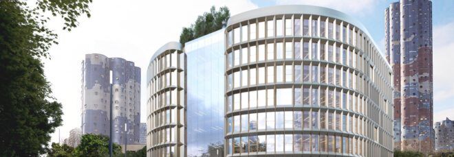 rounded glass building with trees on roof