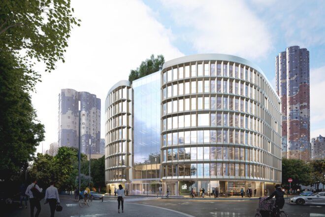 rounded glass building with trees on roof