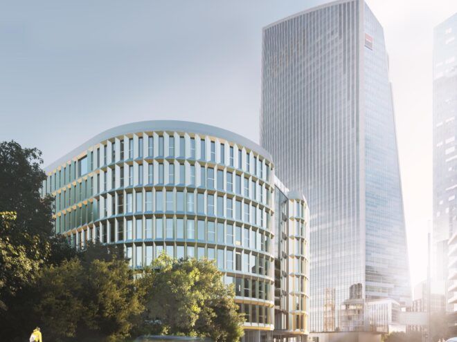 curved glass building near a skyscraper