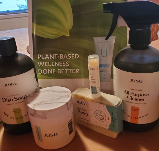 natural skincare and cleaning products in a box