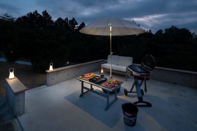 small white chair and table on outdoor patio