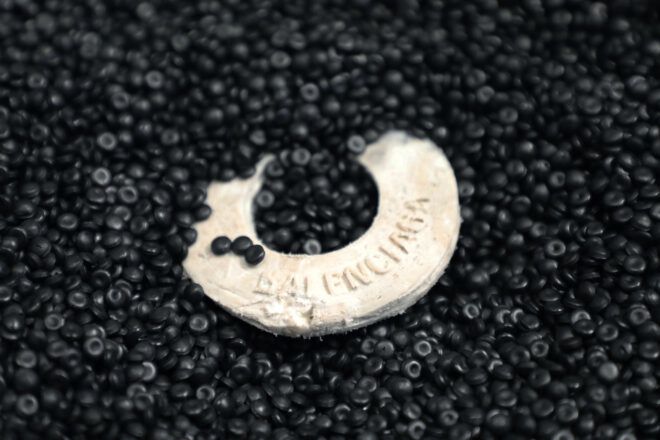 single white Balenciaga earring