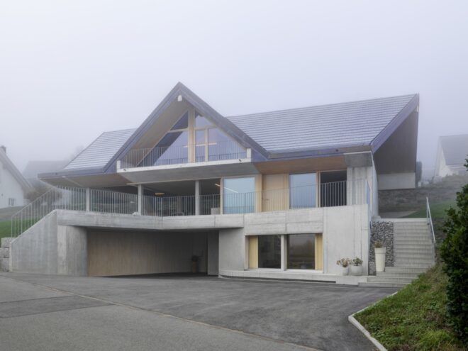 three-story wood and concrete home