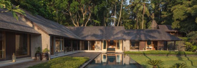 long pool outside stone home