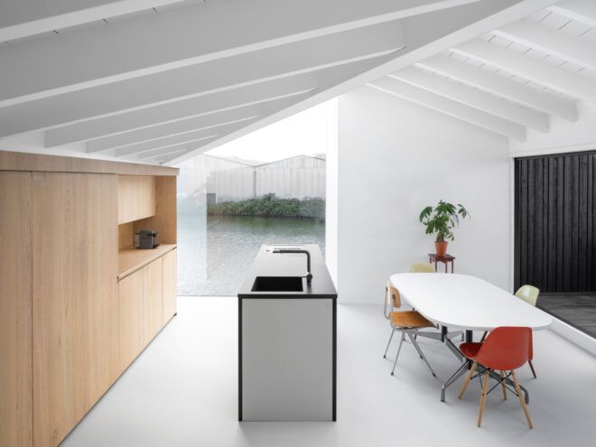 white kitchen with wood cabinets