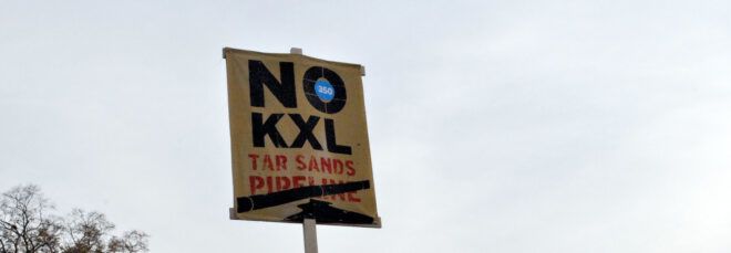 sign that reads "No KXL Tar Sands Pipeline"