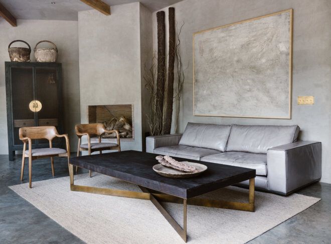 gray sofa near gold and black coffee table