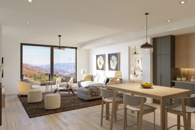 wood dining table next to brown and gray living room