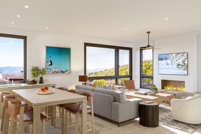 wood dining table behind gray sofa