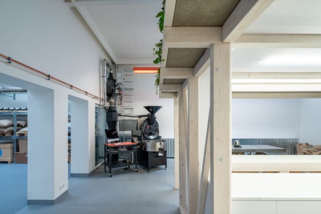 large coffee roasting machine in white room