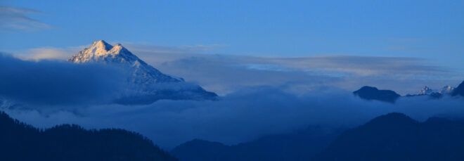 snowy, foggy mountain peaks